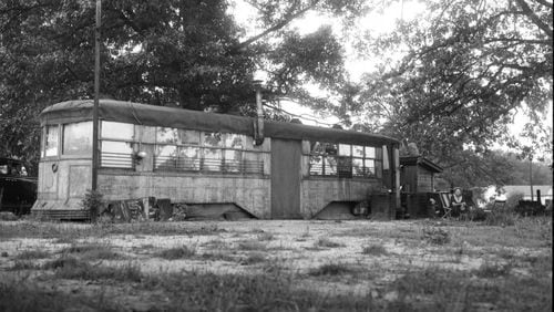 Frances E. Zahn sits outside her repurposed streetcar home in Avondale Estates, sometime between 1937 and 1948. (AJC Archive at the GSU Library AJCN083-027a)