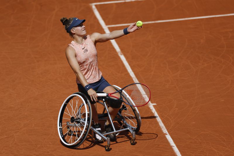 FILE - Netherlands' Diede de Groot serves against China's Zhu Zhenzhen in the women's wheelchair final match of the French Open tennis tournament at the Roland Garros stadium in Paris, France, Saturday, June 8, 2024. (AP Photo/Aurelien Morissard, File)