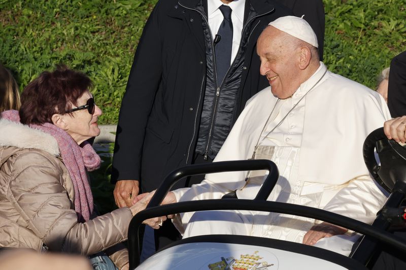 Pope Francis cheers faithful at the end of his meeting with students of the Louvain Catholic University in Ottignies-Louvain-la-Neuve, Belgium, Saturday, Sept. 28, 2024. (AP Photo/Geert Vanden Wijngaert)