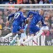 Chelsea's Cole Palmer, right, celebrates with his teammate Malo Gusto after scoring his side's 3rd goal during a British Premier League soccer match between Chelsea and Brighton at Stamford Bridge, London, Saturday, Sept. 28, 2024. (AP Photo/Kin Cheung)