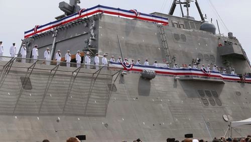 FILE - Thousands attend the commissioning ceremony for the USS Manchester at the New Hampshire State Pier in Portsmouth, N.H.,on Saturday, May 26, 2018. (Ioanna Raptis/Portsmouth Herald via AP)