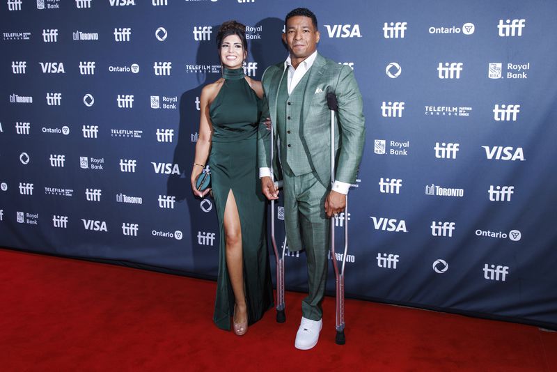 Laura Robles and Anthony Robles attend the premiere of "Unstoppable" at Roy Thomson Hall during the Toronto International Film Festival on Friday, Sept. 6, 2024, in Toronto. (Cole Burston/The Canadian Press via AP)