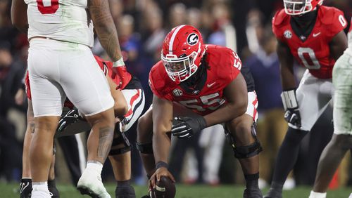 Georgia offensive lineman Jared Wilson (55) prepares to snap the ball during the fourth quarter against Mississippi at Sanford Stadium, Saturday, November 11, 2023, in Athens, Ga. Georgia won 52-17. (Jason Getz / Jason.Getz@ajc.com)