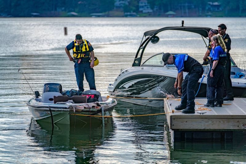 Authorities were searching for fishermen who went missing Wednesday afternoon when two boats collided on Lake Lanier. One body was found Thursday.