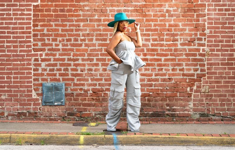 Danielle Miller poses for a portrait in downtown East Point, GA on Monday, August 5, 2024. (Seeger Gray / AJC)