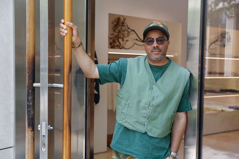 Heavy Market owner Jason Geter poses for a photo inside of his boutique in Buckhead on Tuesday, April 2, 2024. (Natrice Miller/ Natrice.miller@ajc.com)