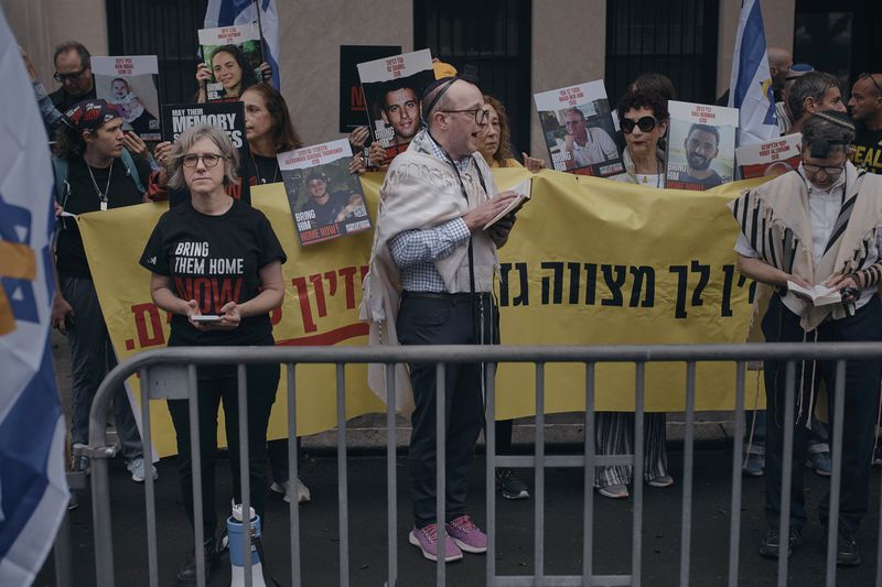 People protest against Prime Minister of Israel Benjamin Netanyahu during the 79th session of the United Nations General Assembly, in New York, on Friday, Sept. 27, 2024. (AP Photo/Andres Kudacki)