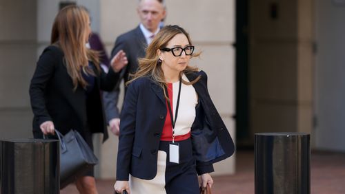 Jeannie Rhee, a lawyer representing Google in the Department of Justice's antitrust case against the tech giant, leaves the U.S. District Court for the Eastern District of Virginia for a break in the trial, Monday, Sept. 9, 2024, in Alexandria, Va. (AP Photo/Stephanie Scarbrough)