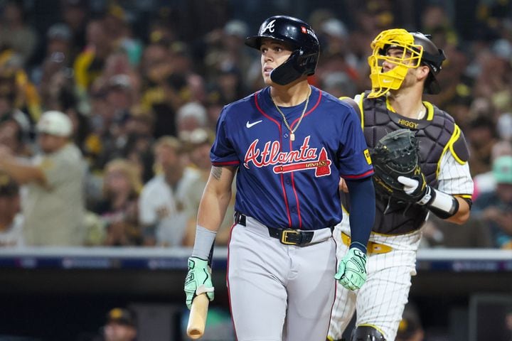 Atlanta Braves’ Gio Urshela strikes out in front of San Diego Padres catcher Kyle Higashioka during the fifth inning of National League Division Series Wild Card Game Two at Petco Park in San Diego on Wednesday, Oct. 2, 2024.   (Jason Getz / Jason.Getz@ajc.com)