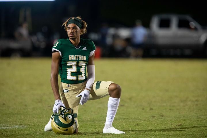 Grayson's Devin Wright (23) kneels after an injury during a GHSA high school football game between Grayson High School and Archer High School at Grayson High School in Loganville, GA., on Friday, Sept. 10, 2021. (Photo/Jenn Finch)