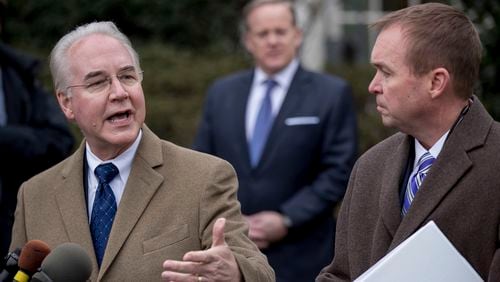 Health and Human Services Secretary Tom Price, left, speaking outside of the White House last month. (AP Photo/Andrew Harnik)