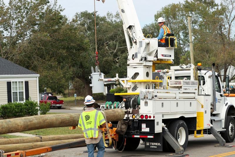 Dominion Energy team members unload a transformer in the aftermath of Hurricane Helene Sunday, Sept. 29, 2024, in North Augusta, S.C. (AP Photo/Artie Walker Jr.)