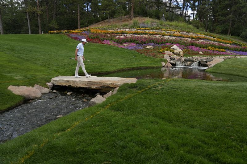 Keegan Bradley heads to the 11th green during the second round of the BMW Championship golf event at Castle Pines Golf Club, Friday, Aug. 23, 2024, in Castle Rock, Colo. (AP Photo/Matt York)