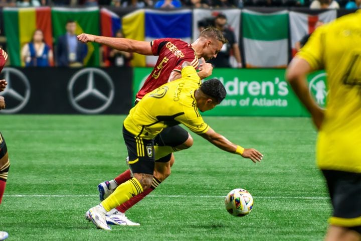 Stian Gregersen fends off opposition during the Atlanta United game against Columbus Crew at Mercedes Benz Stadium in Atlanta, GA on July 20, 2024. (Jamie Spaar for the Atlanta Journal Constitution)