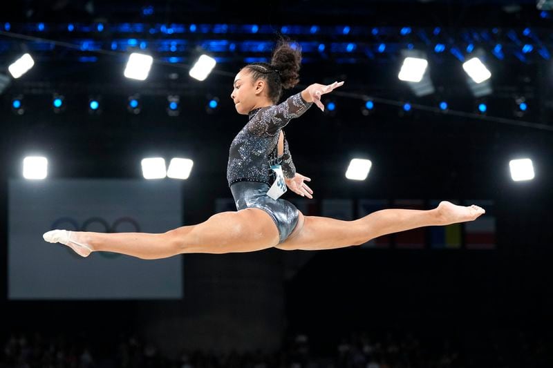 FILE - Hezly Rivera, of United States, competes on the balance beam during a women's artistic gymnastics qualification round at the 2024 Summer Olympics, Sunday, July 28, 2024, in Paris, France. (AP Photo/Abbie Parr, File)