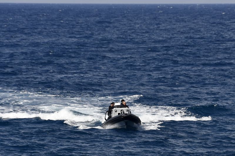 A vessel with coast guards officers takes part in a search and rescue operation after a boat carrying migrants ran into trouble off the coast of the eastern Aegean Sea island of Samos, Greece, on Monday, Sept. 23, 2024. (AP Photo/Michael Svarnias)