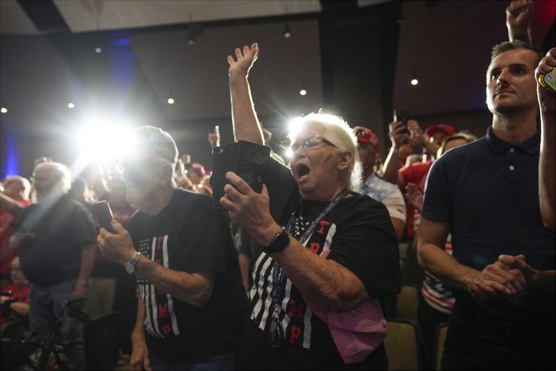 Supporters cheer as Republican presidential nominee former President Donald Trump speaks at a campaign event Saturday, Sept. 28, 2024, in Prairie du Chien, Wis. (AP Photo/Morry Gash)