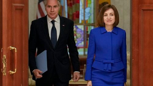 United States Secretary of State Antony Blinken, left, and Moldova's President Maia Sandu, right, arrive to give a joint press conference at the Moldovan Presidency in Chisinau, Moldova, Wednesday, May 29, 2024. (AP Photo/Vadim Ghirda, Pool)