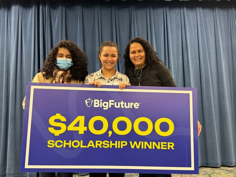 Gwinnett Online Campus senior Alyssa Perez, center, received a $40,000 BigFuture scholarship from the College Board. She is photographed with her sister Andrea Perez and mother Eunice Perez. (Courtesy of Gwinnett County Public Schools)