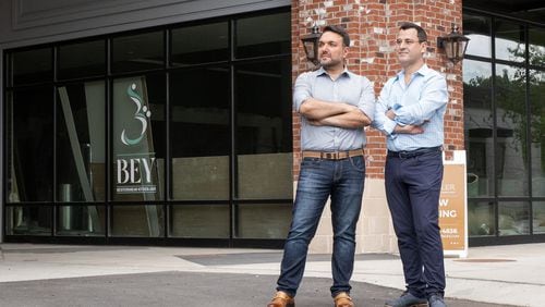Marc Mansour and Chaouki "C.K." Khoury are the owners of BEY Mediterranean Kitchen & Bar in Roswell's Southern Post development. / Courtesy of BEY Mediterranean Kitchen & Bar