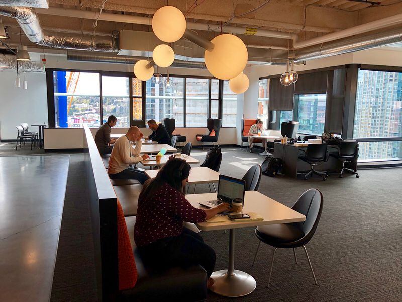 Amazon's office spaces at the company's Seattle headquarters feature many common areas and fewer defined offices to help stimulate collaboration. (Scott Trubey / Scott.Trubey@ajc.com)