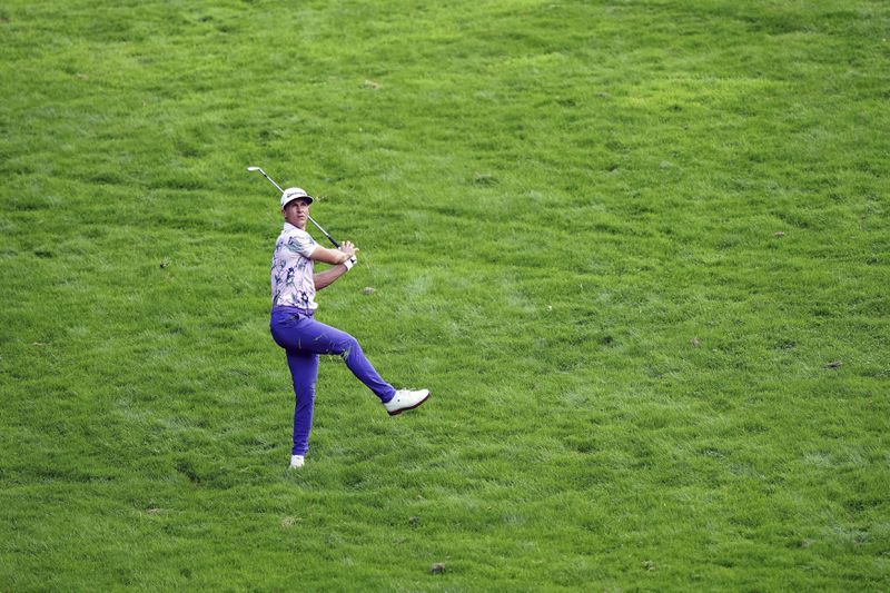 Denmark's Thorbjorn Olesen plays from the 1st fairway during day two of the 2024 BMW PGA Championship at Wentworth Golf Club in Virginia Water, England, Friday Sept. 20, 2024. (Zac Goodwin/PA via AP)