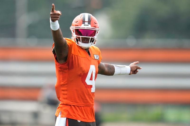 Cleveland Browns quarterback Deshaun Watson (4) gestures during a joint NFL football practice with the Minnesota Vikings, Thursday, Aug. 15, 2024, in Berea, Ohio. (AP Photo/Sue Ogrocki)