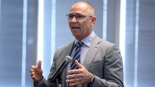 Steve Knudsen was named Gwinnett County school board chair for 2024. Here, he's shown speaking during a candidate forum April 20, 2022, in Duluth. (Jason Getz / AJC file photo)