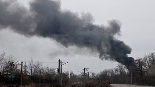 FILE - Smoke rises from an energy facility after a Russian attack in Kharkiv, Ukraine, Friday March 22, 2024. (AP Photo/Yevhen Titov)