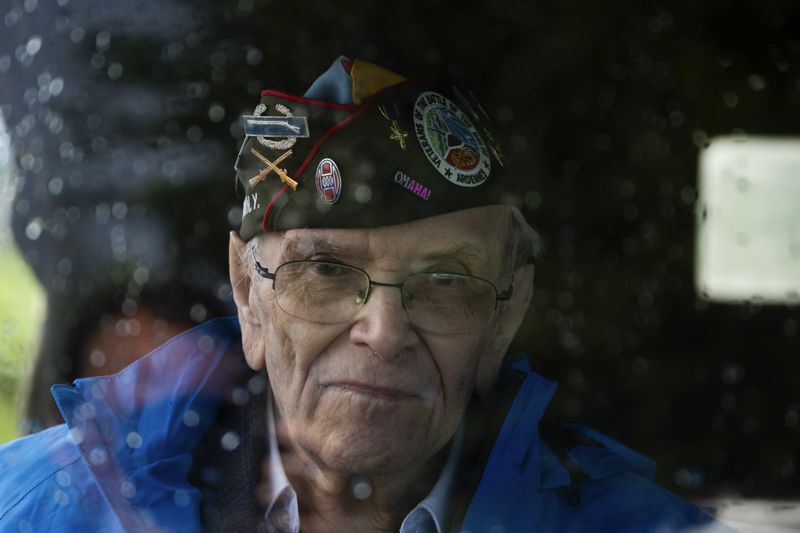 World War II veteran Kenneth Thayer sits in a jeep during a ceremony marking the 80th anniversary of the liberation of the south of the Netherlands in Mesch, Thursday, Sept. 12, 2024. (AP Photo/Peter Dejong, Pool)