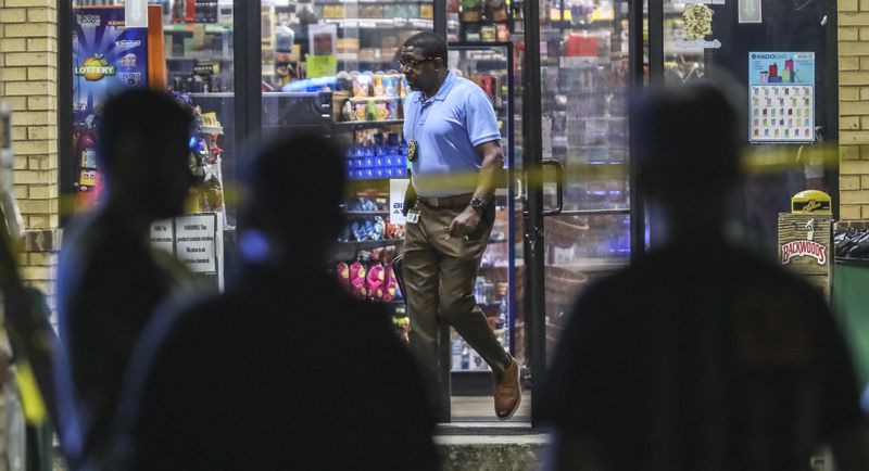 July 19, 2023 DeKalb County:  A man was killed in a shooting at a DeKalb County gas station just outside of east Atlanta early Wednesday morning, July 19, 2023. The shooting was reported around 2 a.m. at a BP station on Flat Shoals Road near I-20 after someone opened fire on employees, DeKalb police said. When officers arrived, they found a man with a gunshot wound. He was pronounced dead at the scene. Details are scarce, but police said they believe the violence stemmed from an armed robbery. An employee told Channel 2 Action News that the owner was putting up displays outside the convenience store when a man approached, fired shots, snatched the cash register and ran away. Two other employees also were present. The owner then went inside the store, where he collapsed and died, the employee told the news station. A funeral home vehicle was seen transporting the body. Police have not released the name of the victim or confirmed that he was the owner. No other information has been released by police. (John Spink / John.Spink@ajc.com)




