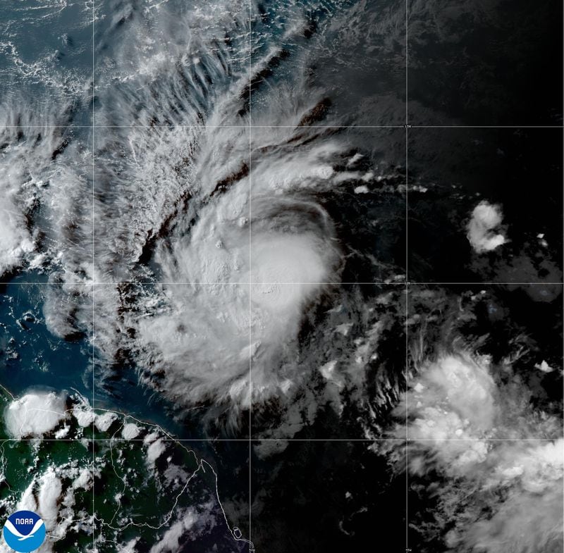 This National Oceanic and Atmospheric Administration satellite image taken at 4:50pm EDT shows hurricane Beryl as it strengthens over the Atlantic Ocean and churns toward the southeast Caribbean on Saturday, June 29, 2024. (NOAA via AP)