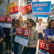 Neighbors and business owners join to support California's Proposition 36 on the November ballot at a news conference in the Venice neighborhood of Los Angeles on Monday, Sept. 30, 2024. (AP Photo/Damian Dovarganes)