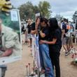 People visit the site of the Nova music festival, where hundreds of revelers were killed and abducted by Hamas and taken into Gaza, on the one-year anniversary of the attack, near Kibbutz Reim, southern Israel, Monday, Oct. 7, 2024. (AP Photo/Ohad Zwigenberg)