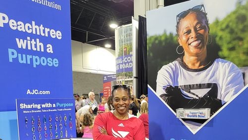 Olympic gold medalist Gail Devers, who will run Peachtree with a Purpose for the Atlanta Track Club, was at the Health & Fitness Expo to meet other runners and sign autographs.
