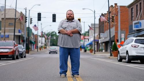 East Palestine, Ohio Mayor Trent Conaway poses for a photo on Market Street, Saturday, July 15, 2023, in East Palestine. (Matt Freed for the Atlanta Journal Constitution)