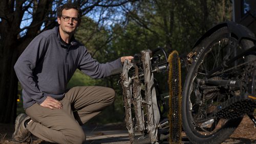 Alex Benigno rides about 10 miles a day on his stand up bike equipped with a homemade trailer covered with magnets that pick up nails, screws and bolts that would otherwise give people flat tires.