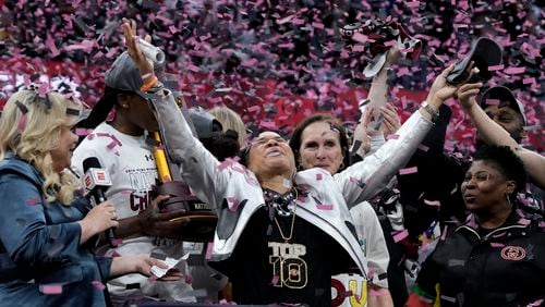 FILE - South Carolina head coach Dawn Staley celebrates after the Final Four college basketball championship game against Iowa in the women's NCAA Tournament, Sunday, April 7, 2024, in Cleveland. (AP Photo/Morry Gash, File)