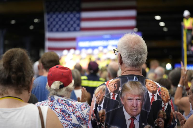 Supporters attend a campaign event for Republican presidential nominee former President Donald Trump at Alro Steel, Thursday, Aug. 29, 2024, in Potterville, Mich. (AP Photo/Alex Brandon)