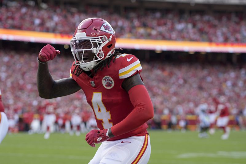 Kansas City Chiefs wide receiver Rashee Rice celebrates after scoring during the first half of an NFL football game against the Cincinnati Bengals Sunday, Sept. 15, 2024, in Kansas City, Mo. (AP Photo/Charlie Riedel)