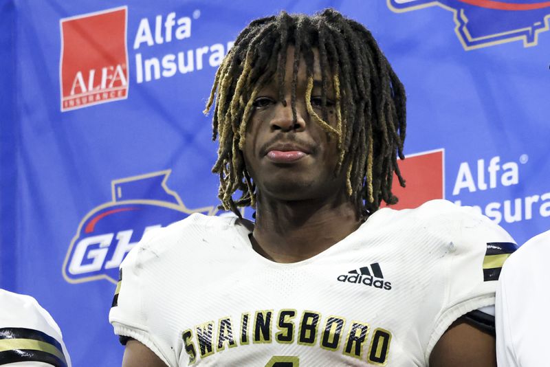 Swainsboro wide receiver Demello Jones (1) reacts to their loss to Prince Avenue Christian in the Class A Division I GHSA State Championship game at Mercedes-Benz Stadium, Monday, December. 11, 2023, in Atlanta. Prince Avenue Christian won 49-32. Jones is an AJC Super 11 and a Georgia commit. (Jason Getz / Jason.Getz@ajc.com)