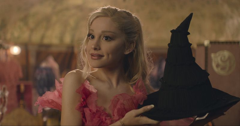 This image released by Universal Pictures shows Ariana Granda as Glinda in the film "Wicked." (Universal Pictures via AP)