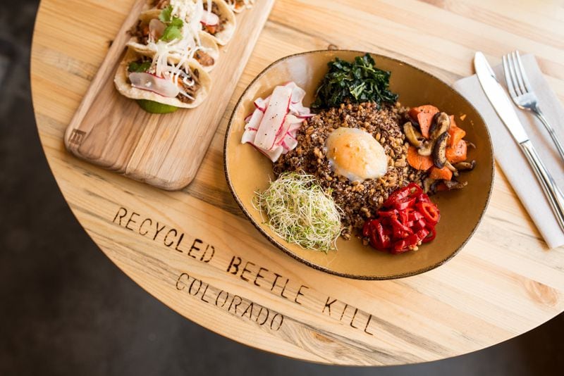  Superfood Grain Bowl with crispy farro, quinoa, kale, radishes, sprouts, roasted carrots, pickled chiles, shittake mushrooms, poached egg, and miso ginger vinaigrette. Photo credit- Mia Yakel.