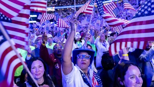 Through four days of flag waving, sign holding, “USA” chanting and lengthy declarations of devotion to democracy, the Democratic National Convention was a full-throated declaration that Democrats can love America, too. And do. (Arvin Temkar / AJC)