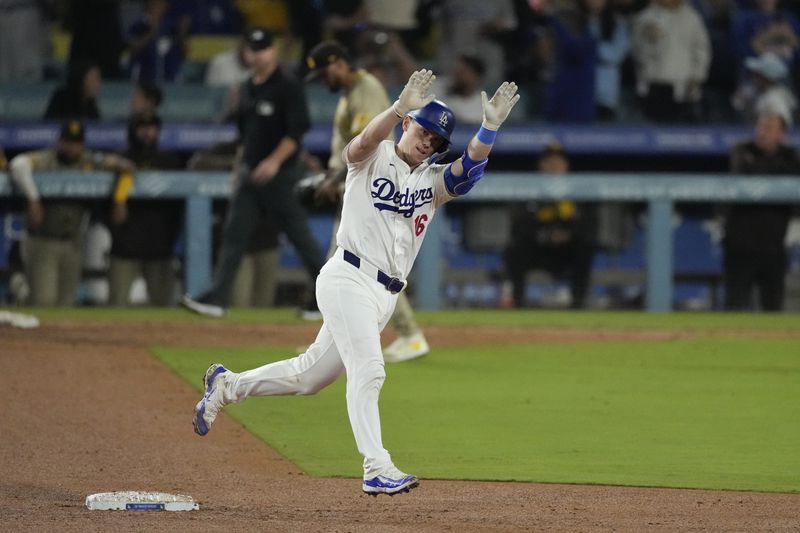 Los Angeles Dodgers' Will Smith celebrates his two-run home run during the seventh inning of a baseball game against the San Diego Padres, Thursday, Sept. 26, 2024, in Los Angeles. (AP Photo/Mark J. Terrill)