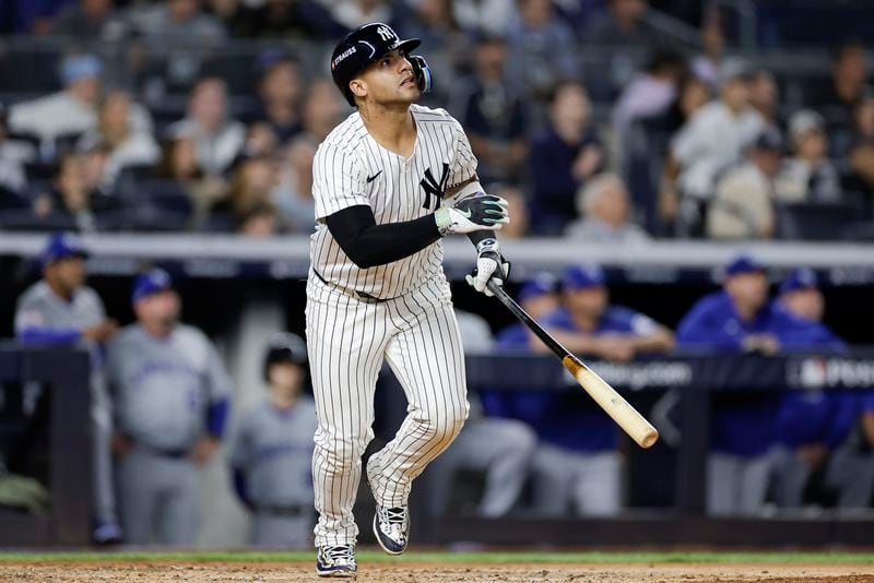 New York Yankees' Gleyber Torres reacts after hitting a two-run home run against the Kansas City Royals during the third inning Game 1 of the American League baseball division series, Saturday, Oct. 5, 2024, in New York. (AP Photo/Adam Hunger)