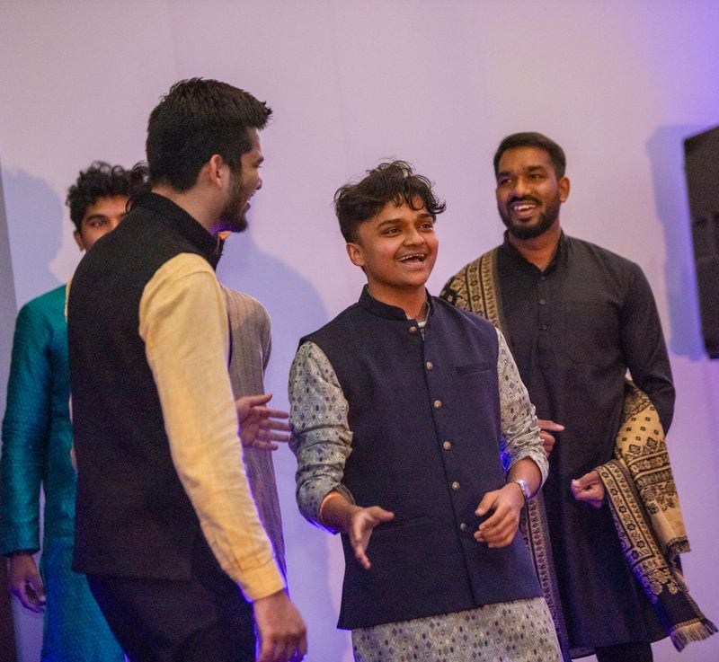 Vishrut Thaker, the president of MannMukti, a student organization that focuses on mental health education, outreach and awareness at Georgia State University, speaks before a Diwali fashion show on Wednesday, Nov. 15, 2023. (Jenni Girtman for The Atlanta Journal-Constitution)