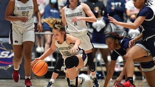 March 13, 2021 Macon - Woodstock's Karson Martin (15) goes for a loose ball during the 2021 GHSA State Basketball Class AAAAAAA Girls Championship game at the Macon Centreplex in Macon on Saturday, March 13, 2021 Marietta won 52-47 over Woodstock. (Hyosub Shin / Hyosub.Shin@ajc.com)