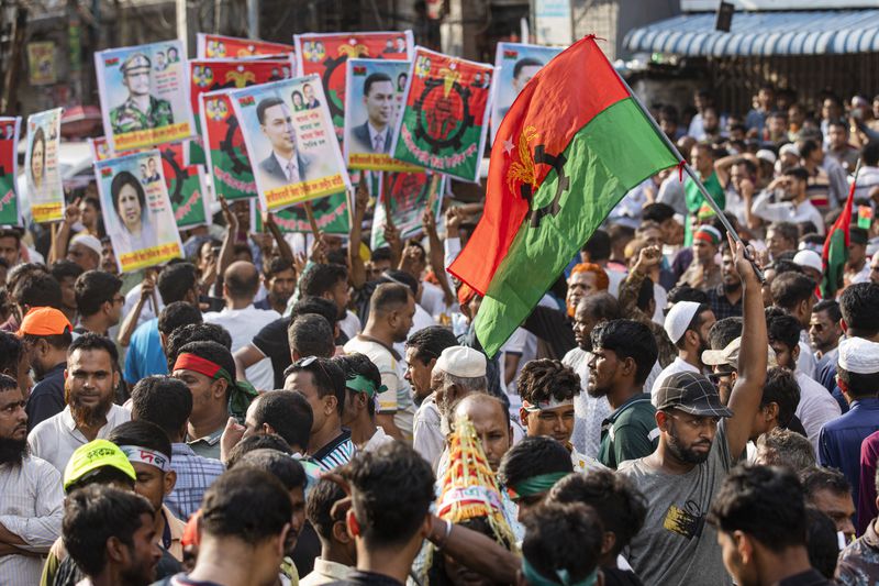 Supporters of the Bangladesh Nationalist Party (BNP) shout slogans during a rally demanding a democratic transition through an election in Dhaka, Bangladesh, Tuesday, Sept.17, 2024. (AP Photo/Rajib Dhar)