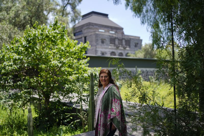 María Teresa Moya, director of the Anahuacalli Museum, poses for a photo on museum grounds in Mexico City, Tuesday, Aug. 20, 2024. Built by Mexican artist Diego Rivera to preserve and display his lifelong collection of pre-Hispanic art, the museum is celebrating its 60th anniversary. (AP Photo/Eduardo Verdugo)